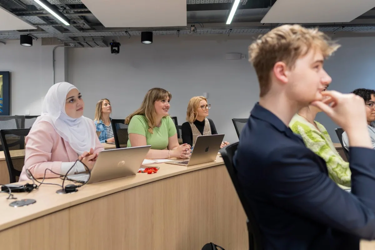 Digital Marketing students listening to lecture in lecture theatre at Leeds City Campus..