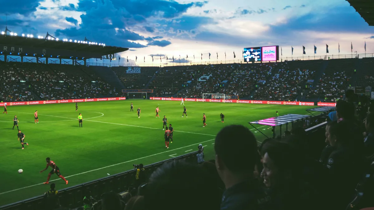 A football match seen from the audience stalls..