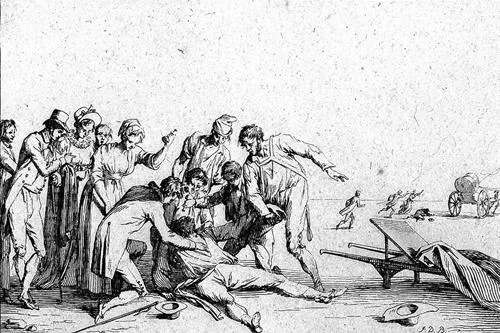 Man surrounded by crowd.