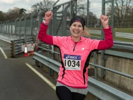 Gill celebrating end of marathon.