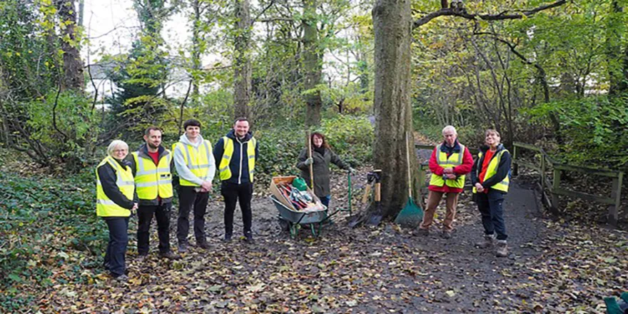 A group of people volunteering in Hunger Hills Woods..