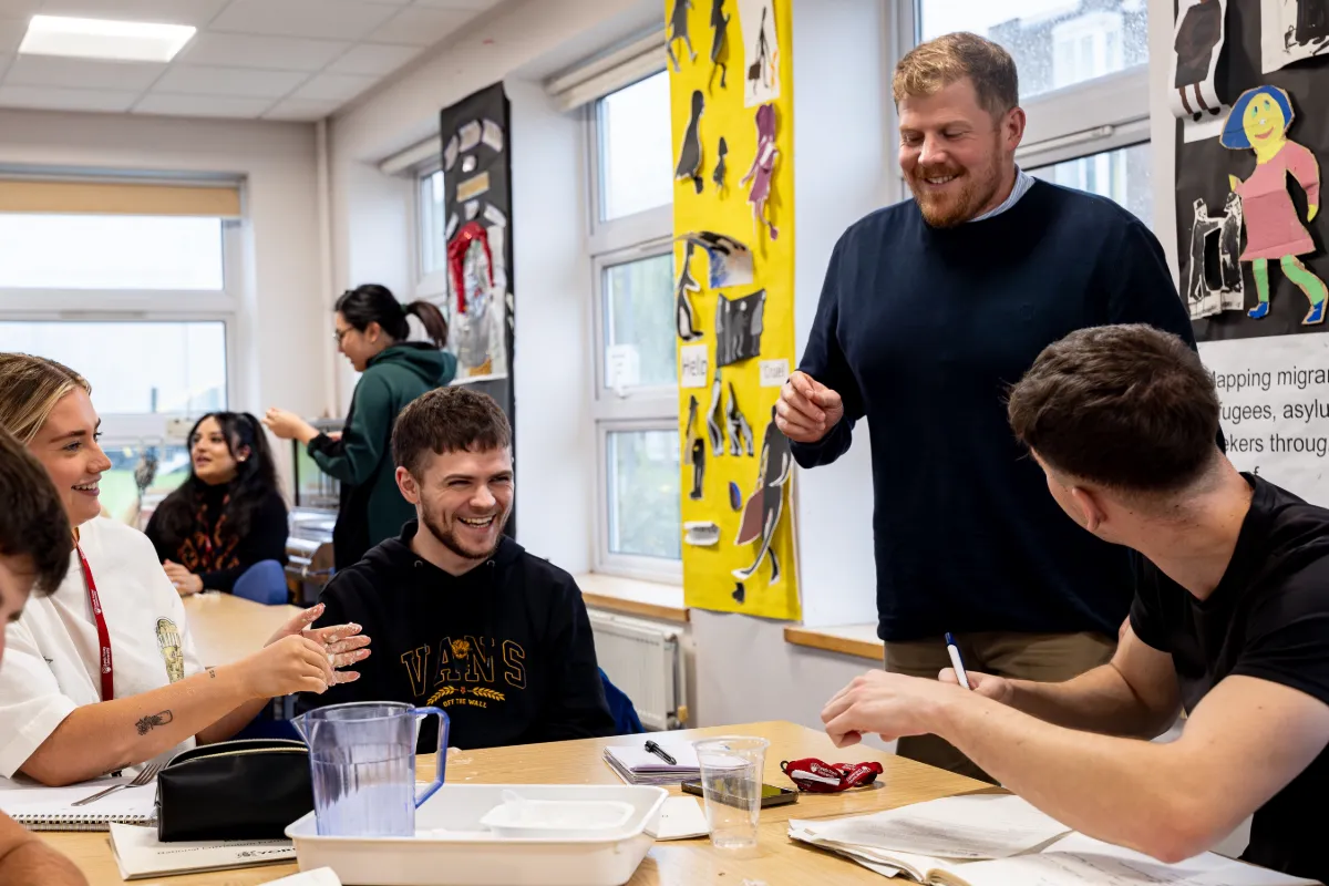 PGCE students learning in classroom.