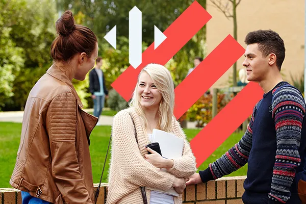 Students talking on campus.