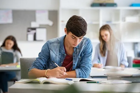 student studying in classroom.