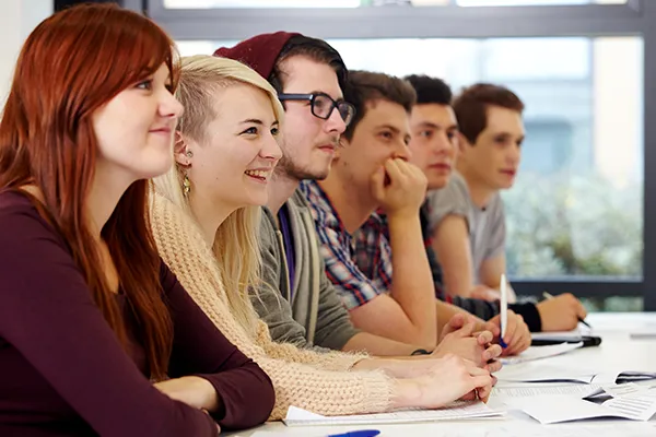 Students learning and engaging in a lecture.