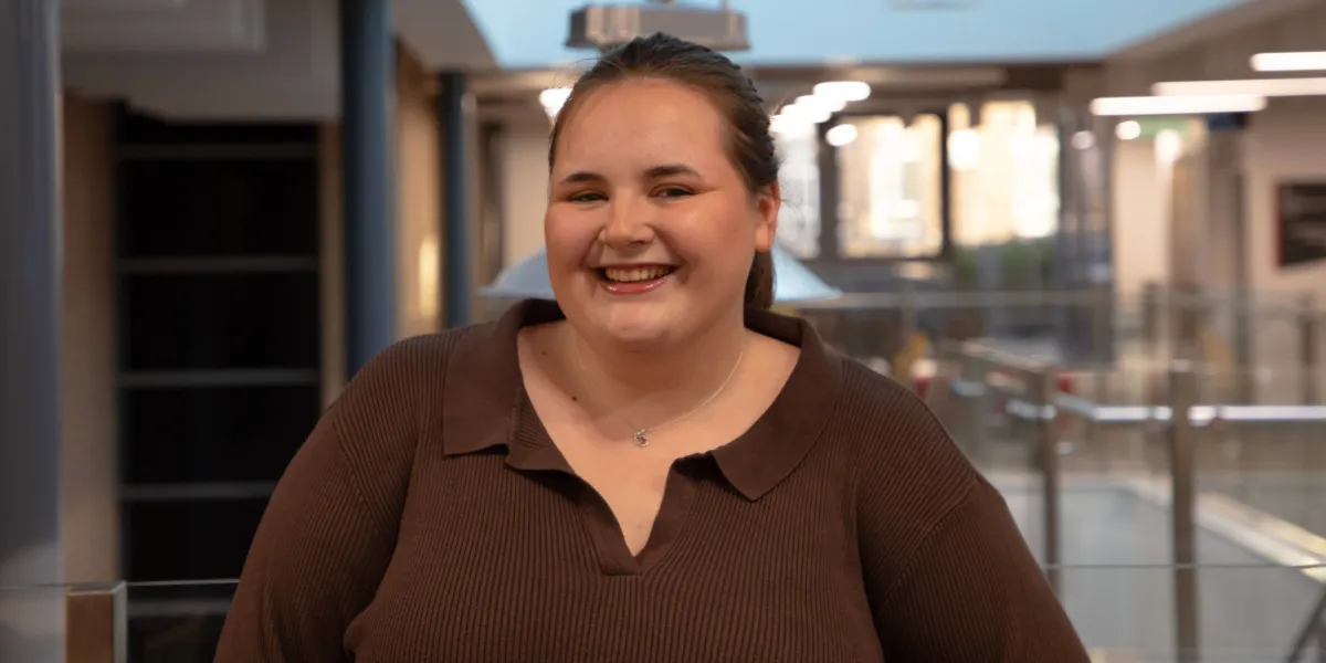 Student smiling.