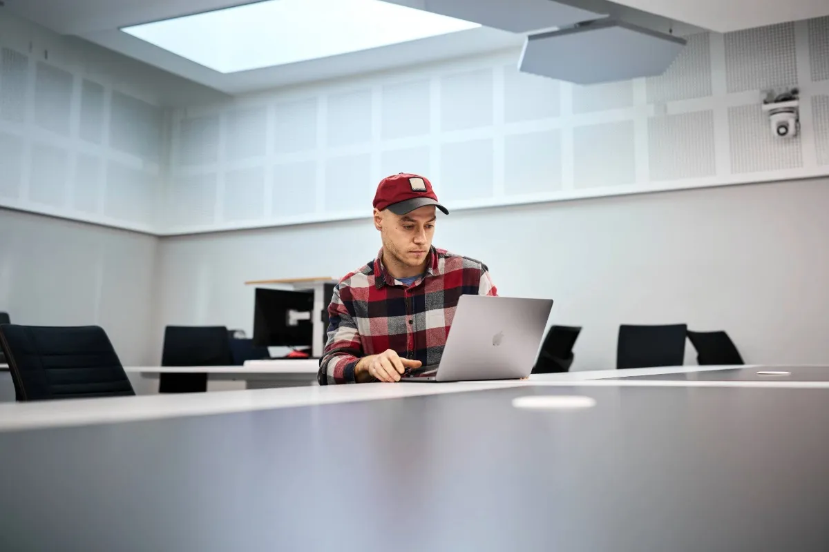 A student using their laptop.