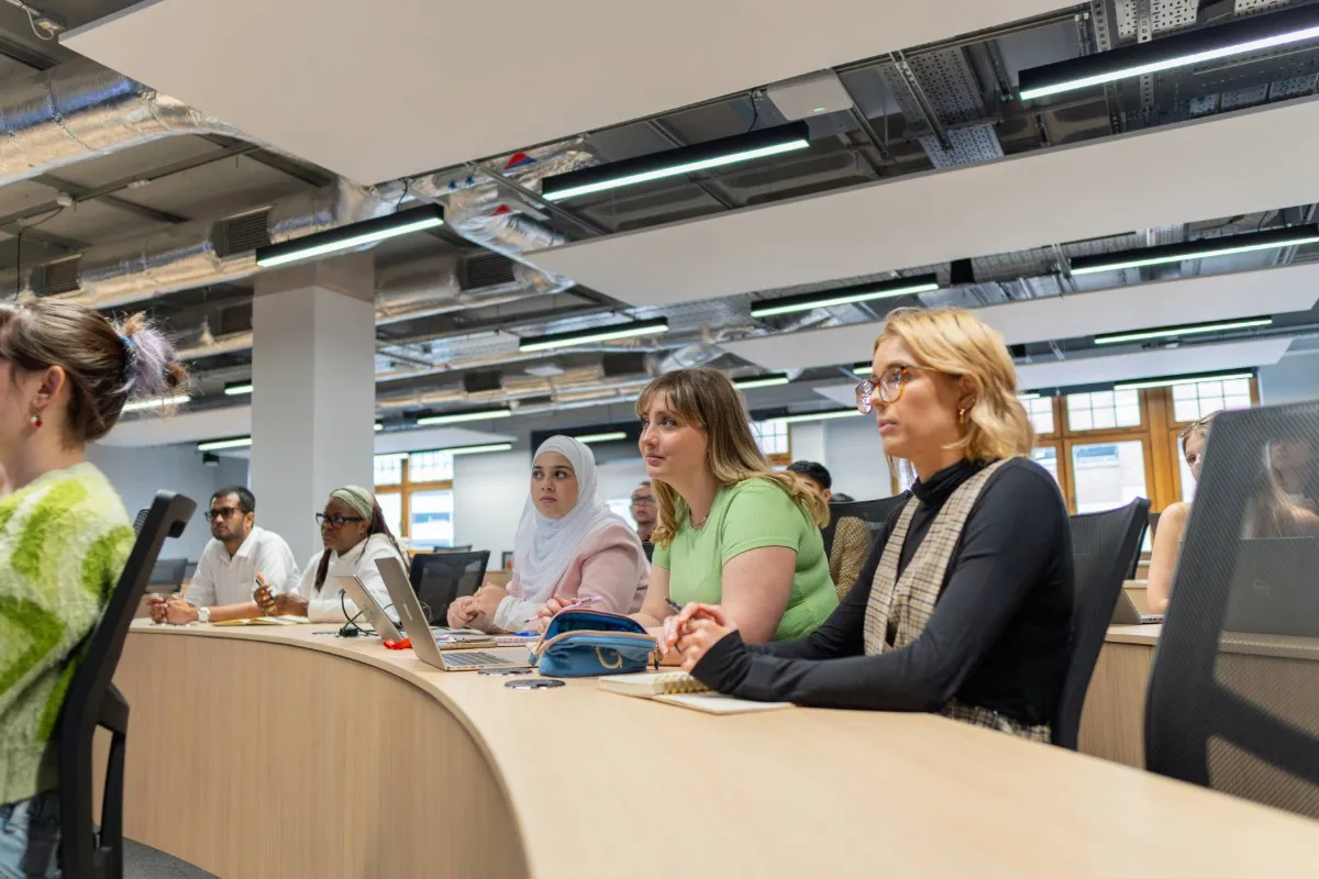 Students at the table in seminar.