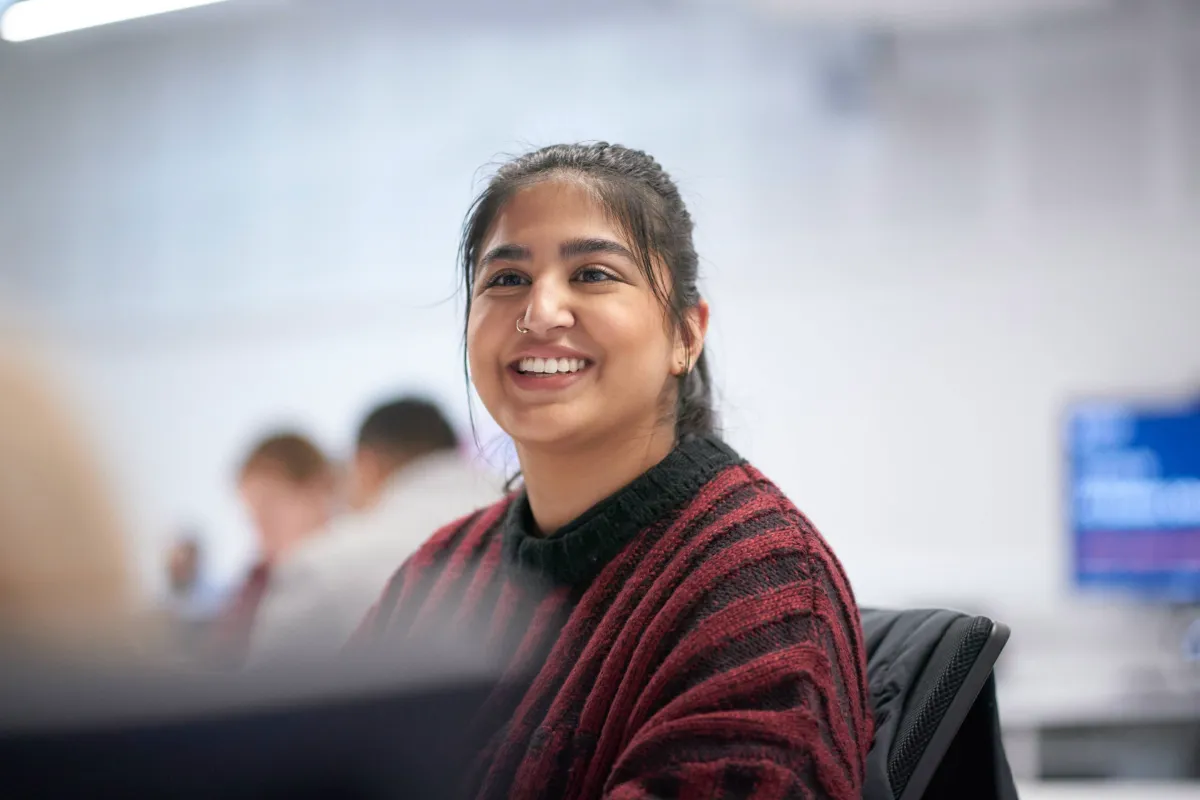 Student smiling.