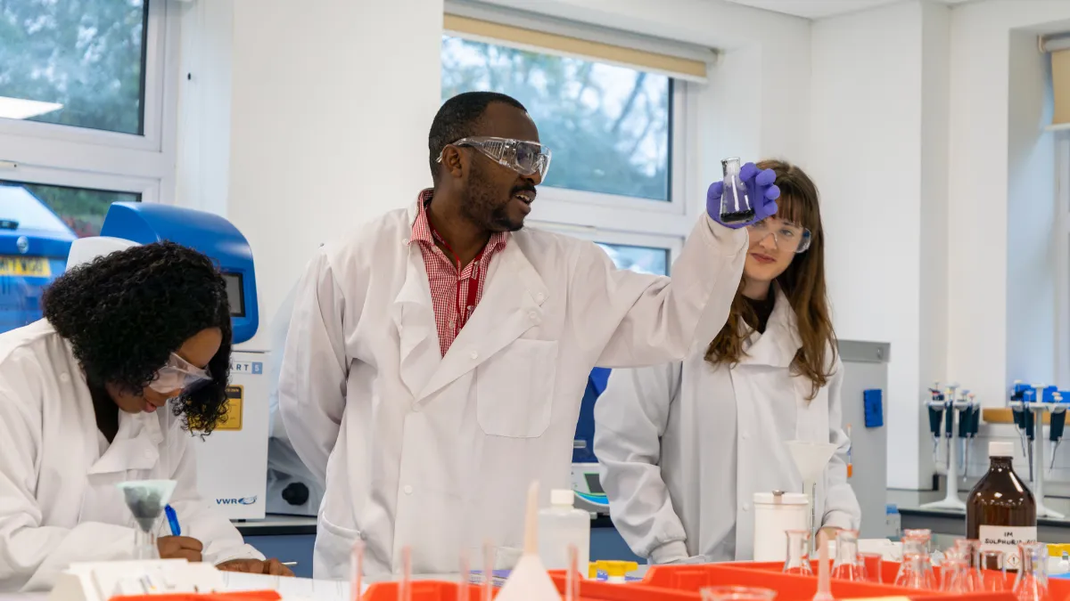 A group of science teacher trainees in a lab at Leeds Trinity University..
