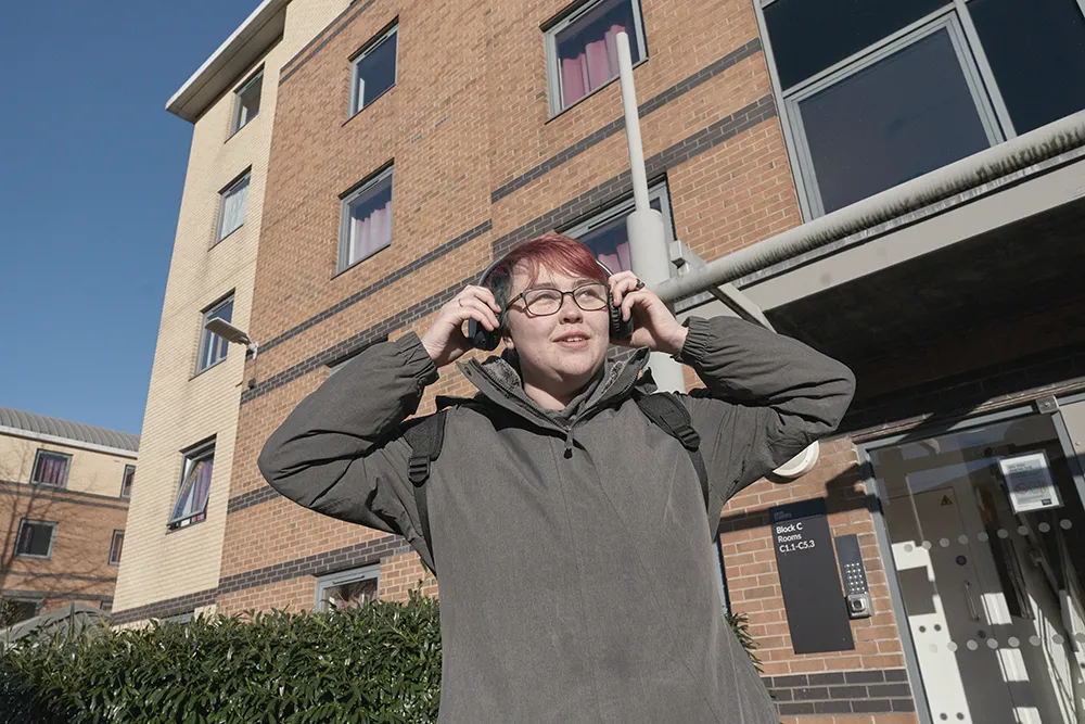 Student stood outside Clarence Dock Village.