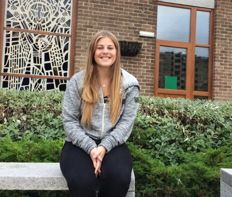 Georgia Walsham sat outside.