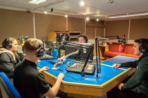 Students in radio studio .