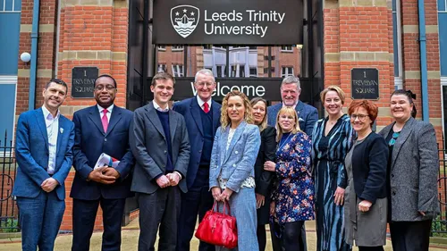 A group picture in front of the City Campus