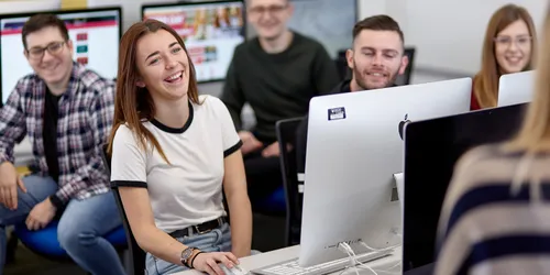 Students sat at computer