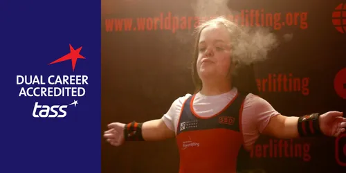 Split screen shows TASS blue logo on left and female powerlifter Charlotte McGuinness in action on right
