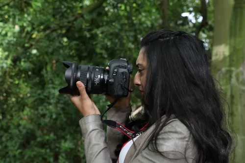 Aqsa taking photograph 
