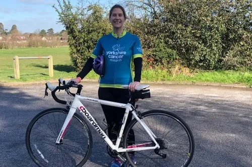 Gill Barker pictured with bike during final challenge 