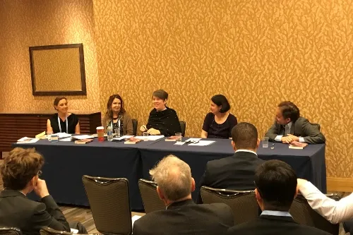 Professor Reverend Jane de Gay sits on a panel at the American Academy of Religion conference
