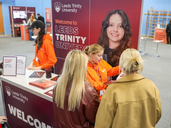 Leeds Trinity student ambassadors talking to guests at an Open Day