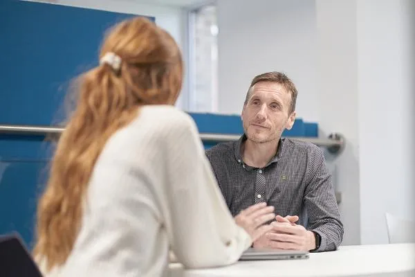 Student receiving support from adviser