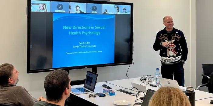 Lecturer teaching class of students