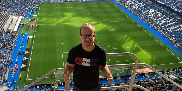 Student stood overlooking football stadium