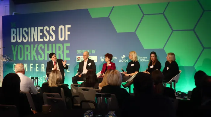 Panel discussion with a host and 4 speakers