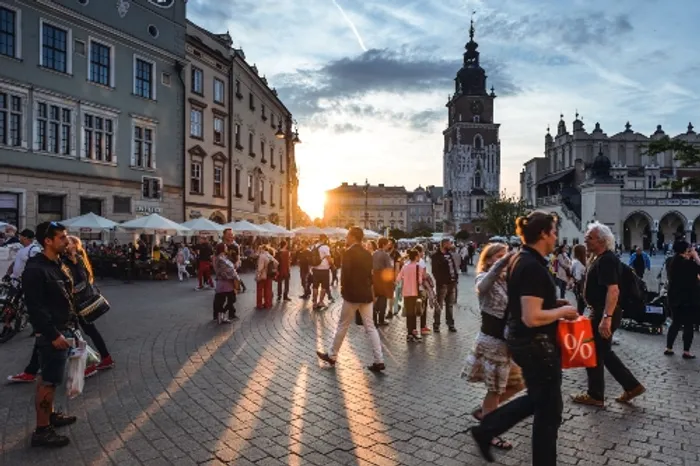 People walking on a concrete street 