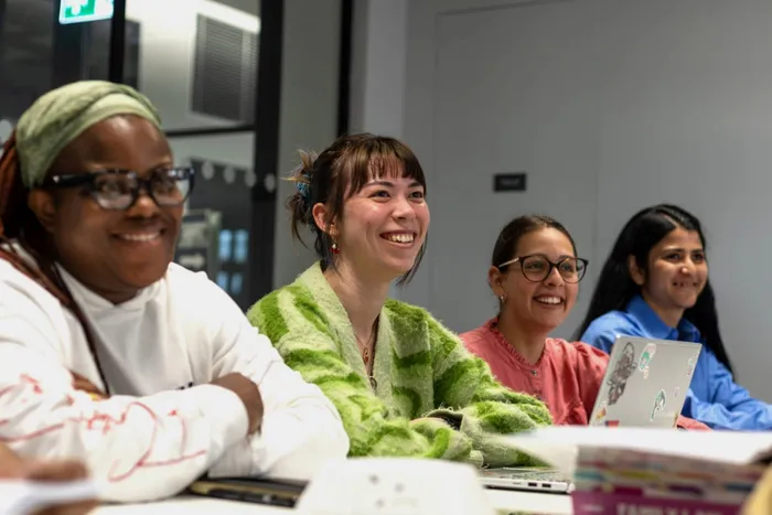 Students smiling in class