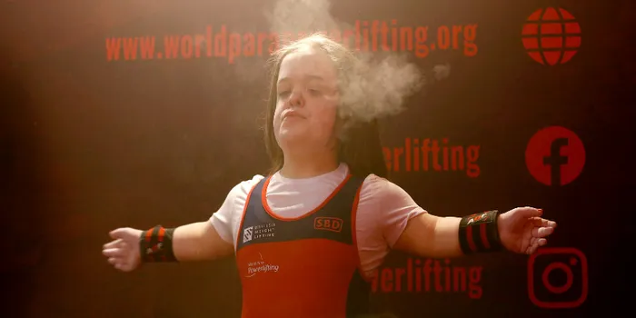 Female student competing in weightlifting at Para Championships