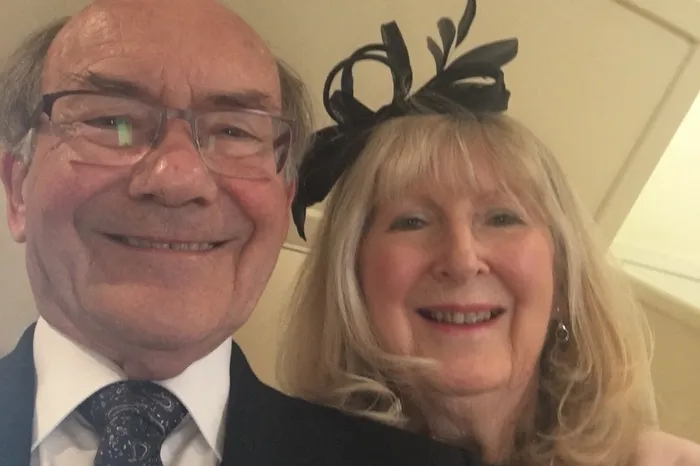 Former staff member John Crewdson and wife with Maundy gift