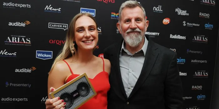 Journalism graduate at industry award event