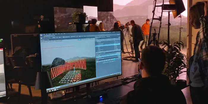 Students working in virtual production film studio