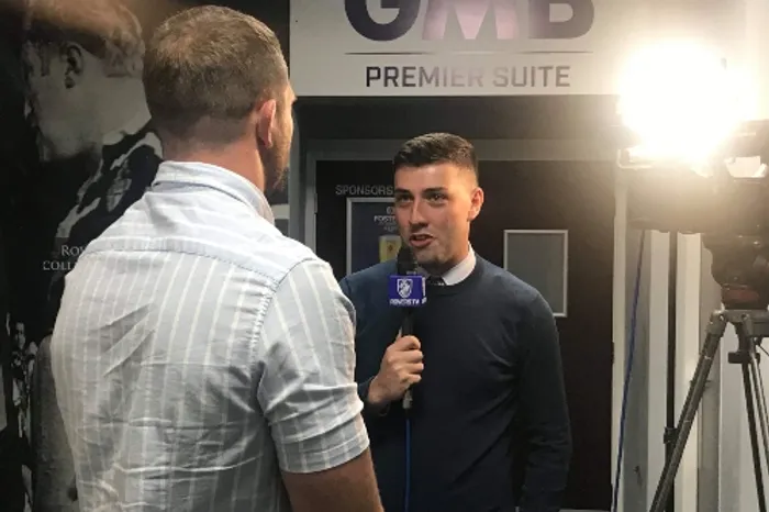 Harry McMullen interviewing someone