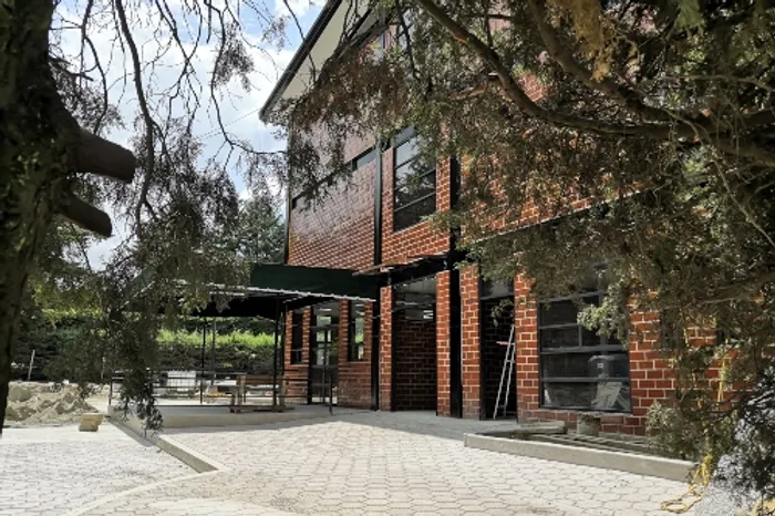 Brick building with trees 