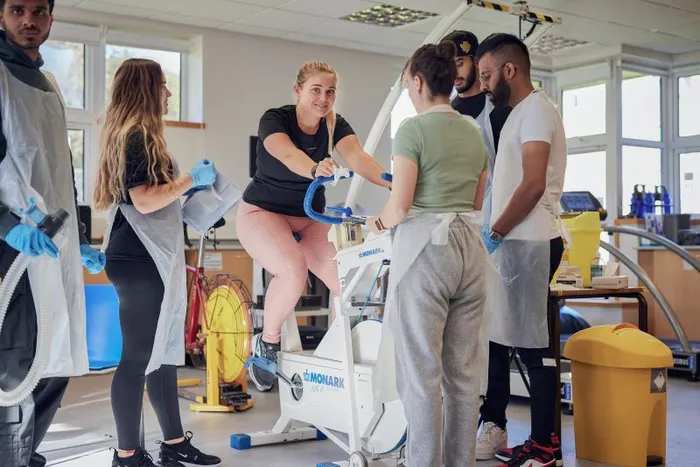 Image of students in the Sports Science lab.