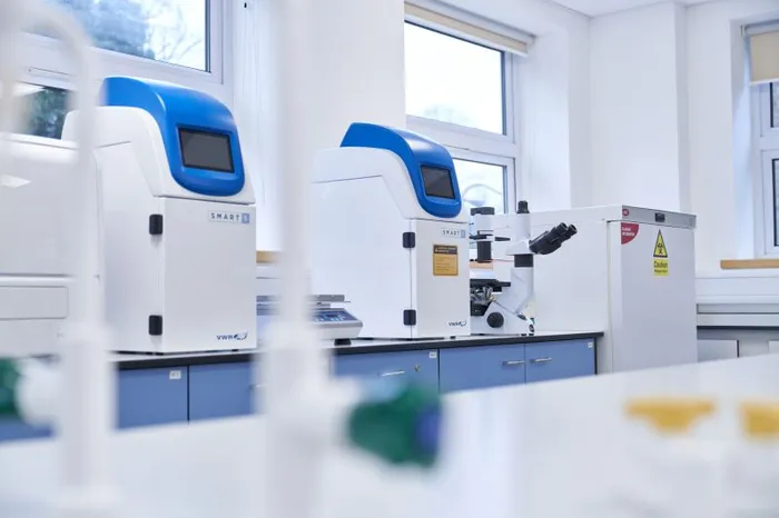 Image of Gel documentation units and inverted microscope, with incubator at the far right.