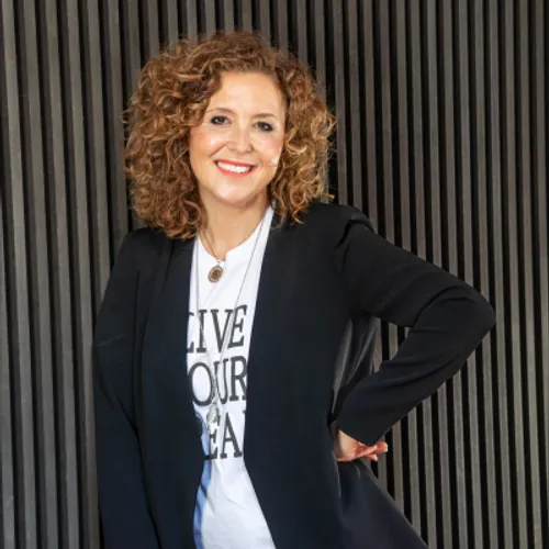 Governor Amy Wilson in white t shirt and dark coloured jacket.