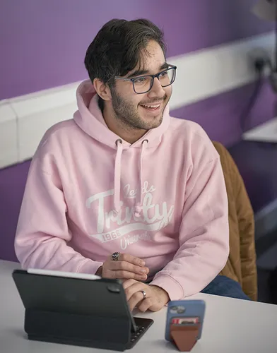 Student working on tablet in seminar