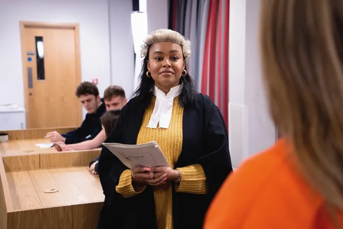 Rhiarnae Campbell law graduate