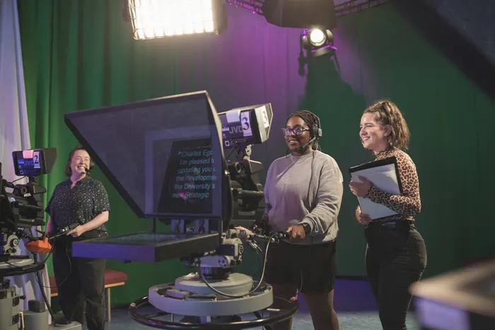 Students filming in TV centre