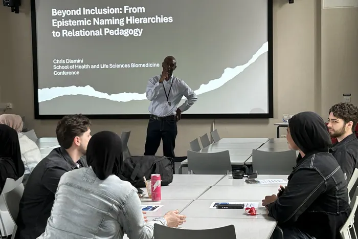 Image of Chris Dlamini at the School of Health and Life Sciences Research Conference.