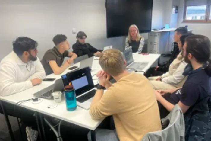 image of students taking part in a Legal Hackathon.