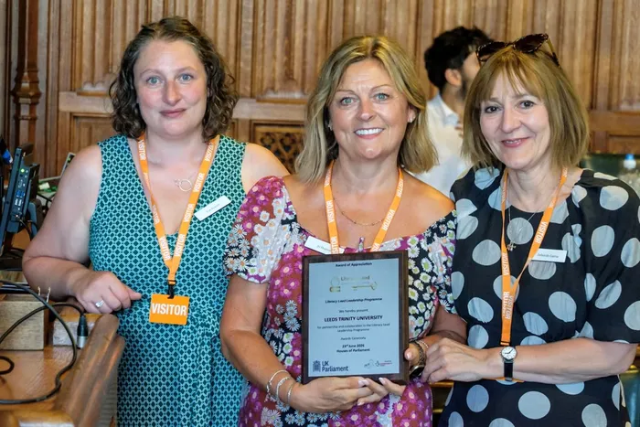 Leeds Trinity staff with a Certificate of Appreciation as part of the Literacy Lead Programme.
