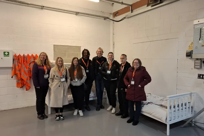 Image of School of Children, Young People and Families staff and students visiting charity, Zarach.